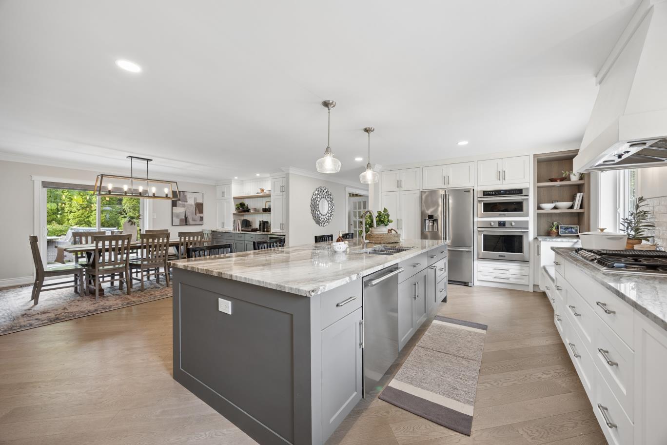 Open-concept kitchen and dining area at 30 Potters Lane, Clarington